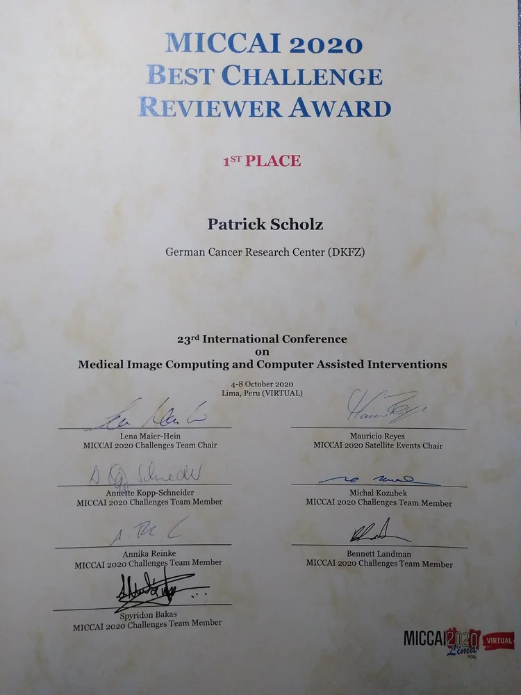 Certificate awarded to Patrick Scholz for achieving 1st place in the MICCAI 2020 Best Challenge Reviewer Award. It includes details of the 23rd International Conference on Medical Image Computing and Computer Assisted Interventions, held virtually in Lima, Peru, along with signatures from committee members.