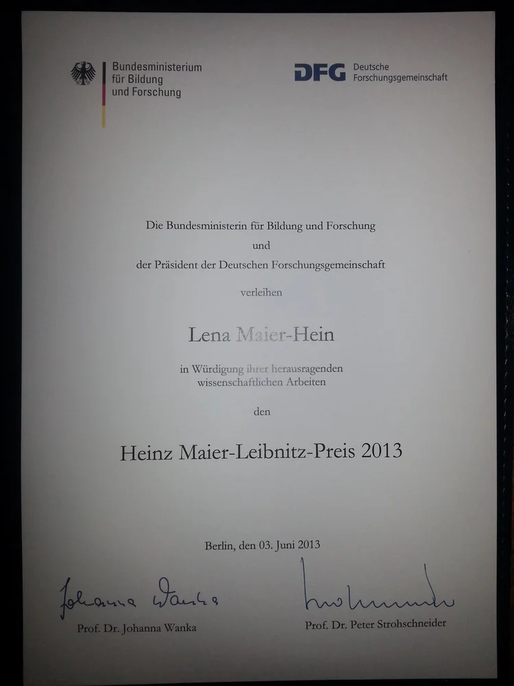 A certificate awarded to Lena Maier-Hein for outstanding scientific work, presented by the German Federal Ministry of Education and Research and the President of the German Research Foundation. It recognizes her achievement with the Heinz Maier-Leibnitz Prize 2013, dated June 3, 2013.
