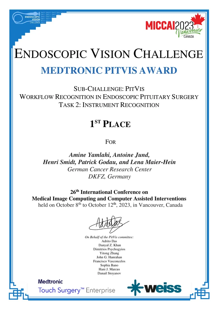 Certificate awarded for 1st place in the Endoscopic Vision Challenge for the Medtronic PitVis Award. The winning team includes Amine Yamlahti, Antoine Jund, Henri Smidt, Patrick Godau, and Lena Maier-Hein from the German Cancer Research Center. Presented at the MICCAI 2023 conference in Vancouver, Canada.