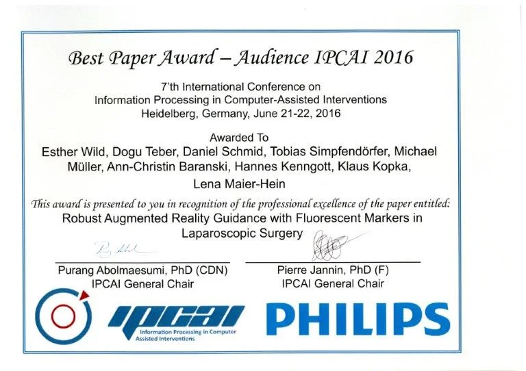Certificate for the Best Paper Award at the 7th International Conference on Information Processing in Computer-Assisted Interventions, held in Heidelberg, Germany, in 2016. The award is presented to a group of researchers for their work on augmented reality guidance in laparoscopic surgery.