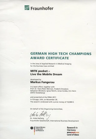 A certificate awarded by Fraunhofer for the "MITK pocket - Live the Mobile Dream" project, developed by Markus Fangarau. It recognizes achievements in applied research in medical imaging, presented at RSNA 2011, with a prize amount of €10,000.