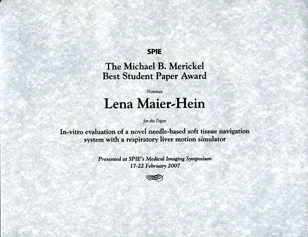 Certificate text recognizing Lena Maier-Hein for the Michael B. Merickel Best Student Paper Award. The award is for her paper titled "In-vitro evaluation of a novel needle-based soft tissue navigation system with a respiratory liver motion simulator." Presented at SPIE's Medical Imaging Symposium, February 2007.